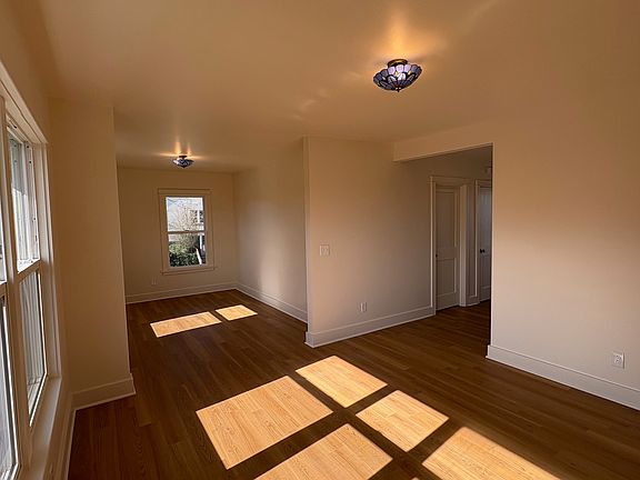 living room /dining room and entrance to hallway