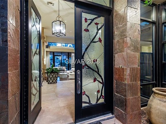 Fall under the influence of France.Enter into the foyer,an invitingintroduction to the interior, softly lit wrought-iron chandeliers, stone floors, floor to ceiling windows and understated elegance.