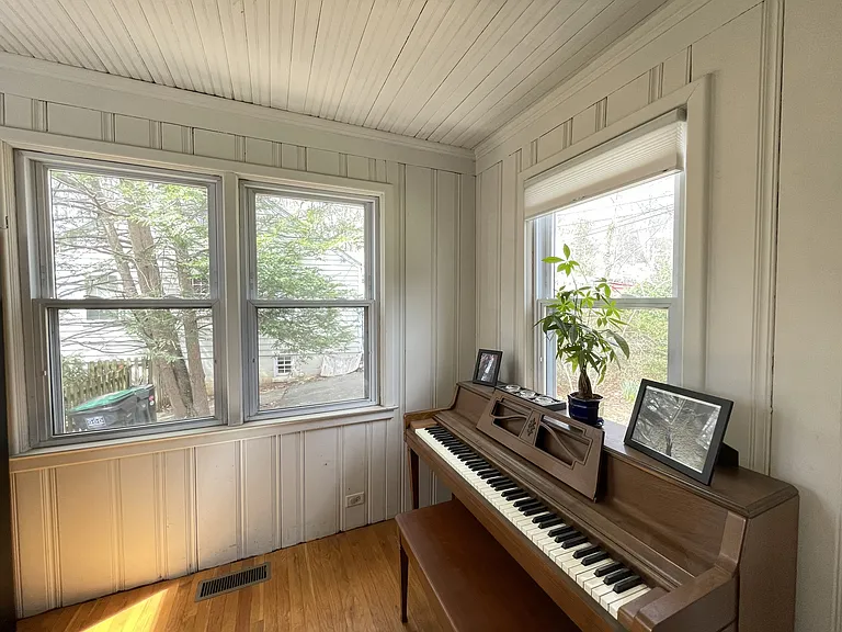 This is the room adjacent to the Living Room. Very bright, and perfect for a music room or home office.