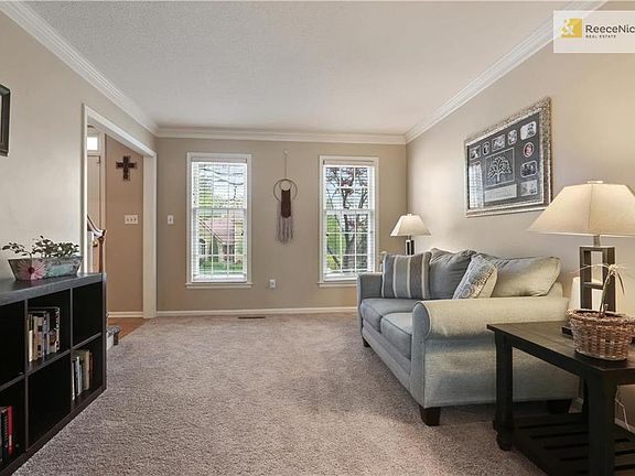 Brand new carpet in this formal living room as well as the adjoining family room