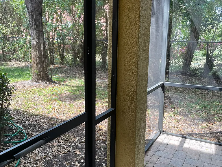 Screened in rear porch
