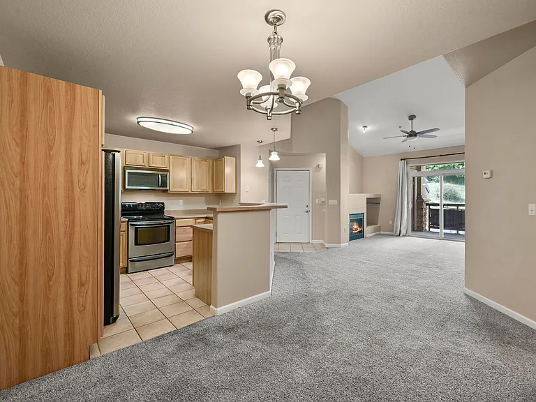 Dining area, kitchen, entry, and living room