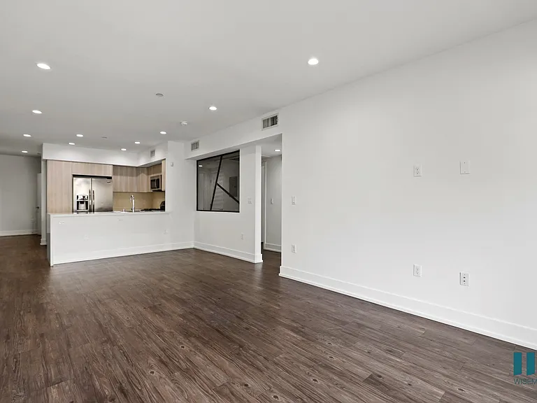 Open-Concept Kitchen, Dining, and Living Room Areas