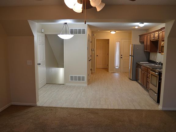 view from living room / stairs to basement on the left