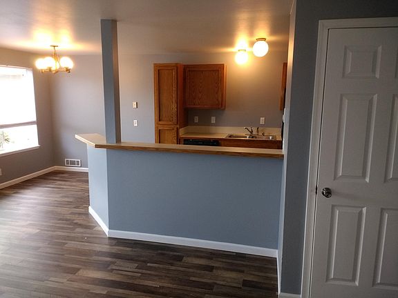 Living room looking into kitchen