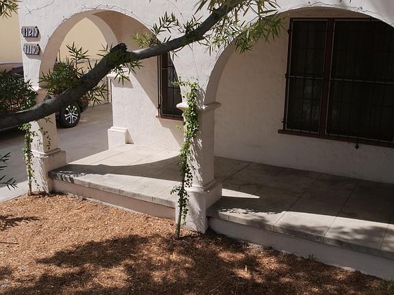 Porch 3 with newly planted trumpet vines.