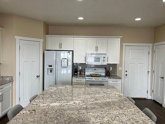 5th image of 8122 N Rock Creek Cove Ln
