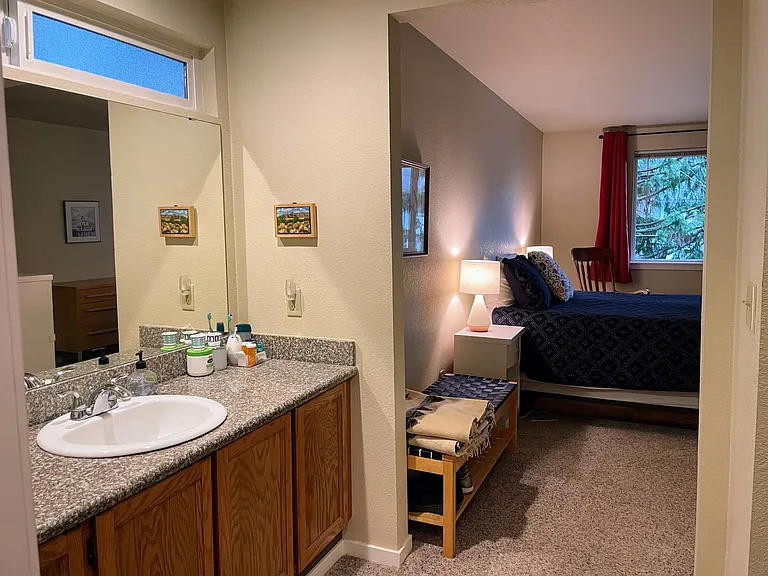 primary vanity with private opening window for fresh air