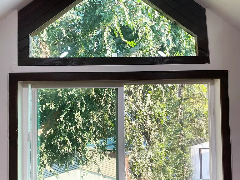Gorgeous custom windows into the loft space - privacy/uv film added to the outside