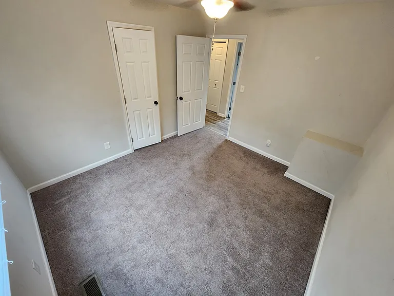 Front house - Bedroom 1 (NOTE: all bedrooms will no longer be carpeted, they will have the same laminate wood flooring as the rest of the house)