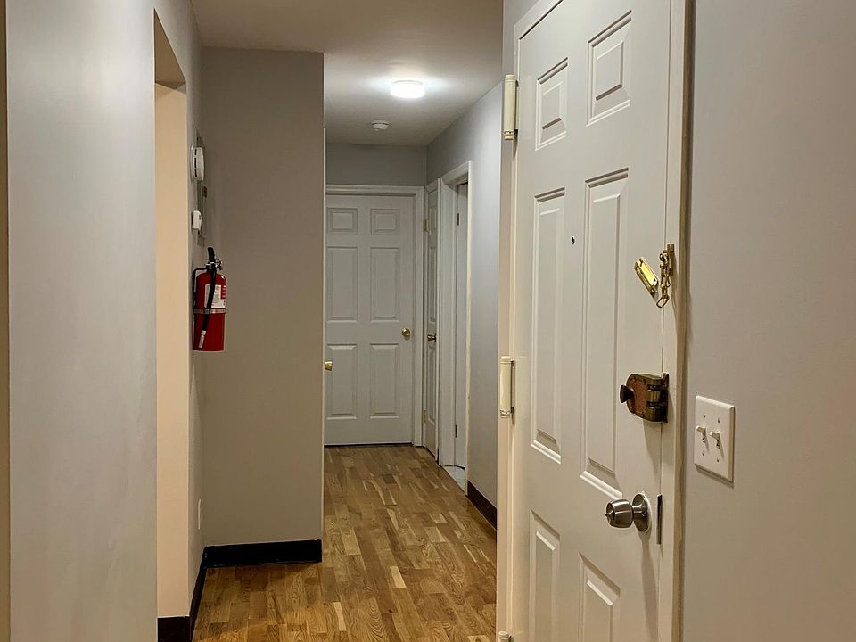 Front Entrance with smoke alarm, carbon alarm and fire extinguisher