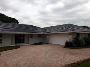 373 S Country Club Dr, Atlantis, FL 33462