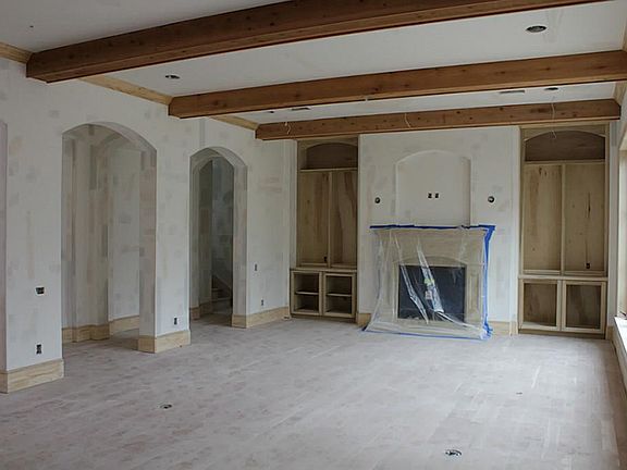 Den also has access to covered patio with outdoor kitchen and half bath. Wet bar with climatized win