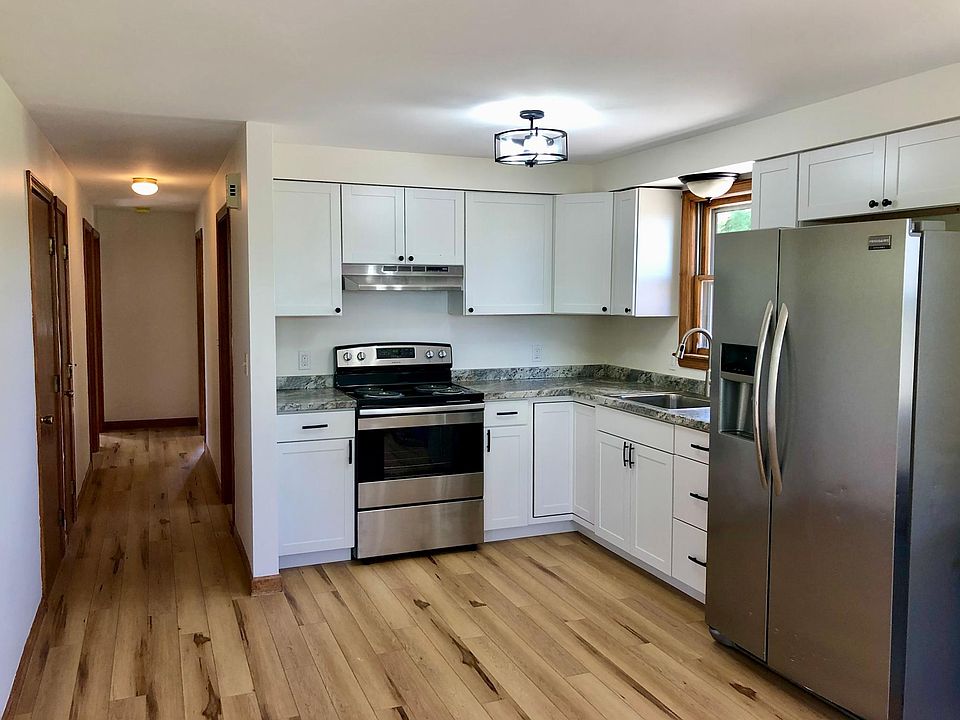 Kitchen & hall (view from side entry)