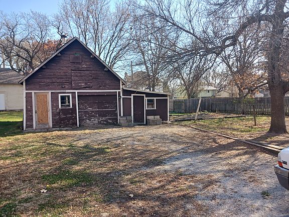 Old but usable garage. Storage and or shop.