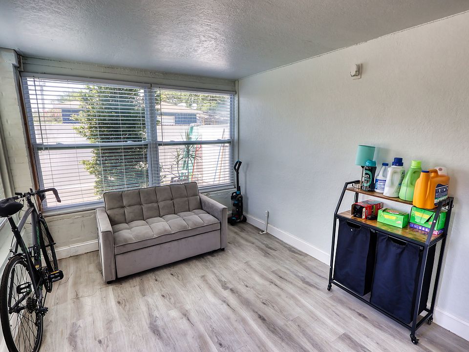 Unit is professionally staged; furniture and decor shown in photos are not included. Rented unfurnished.