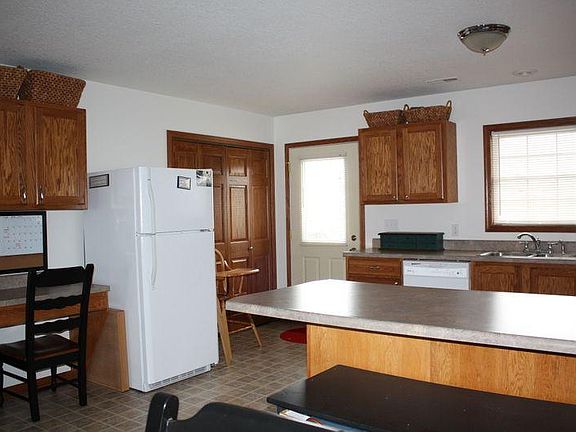 laundry toom to right of fridge