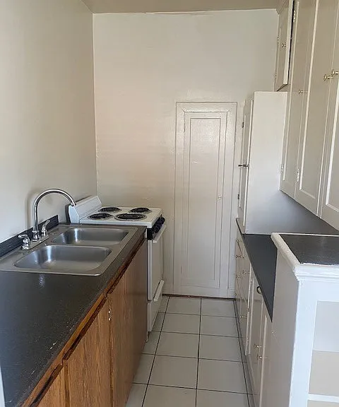 The Travis Apartments — Photo 19