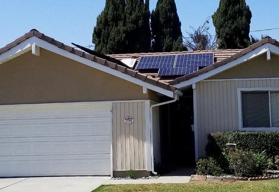 Front of house - dual pane windows, 2 car garage, new landsc