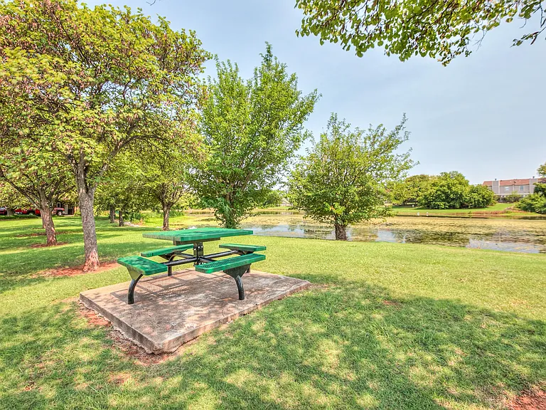 Green belt in the backyard is maintained by the city and has this picnic area