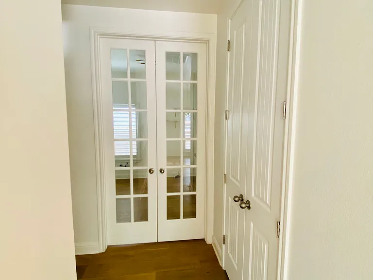 French doors into 3rd bedroom / office