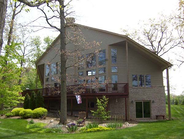Back of house facing pond