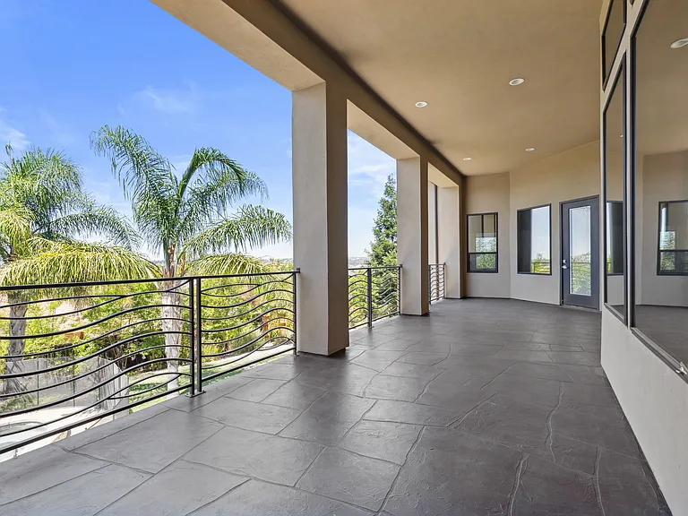 large balcony overlooking yard and Sac downtown views