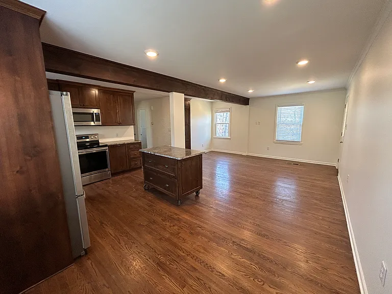 Large living room / dining area, with open design.