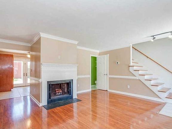 Open living room w/ fireplace!