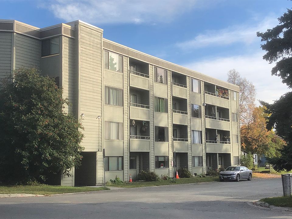 Exterior of building in summer.