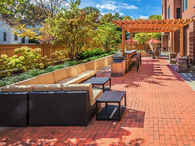 Unwind outdoors in our stylish patio lounge and grilling area.