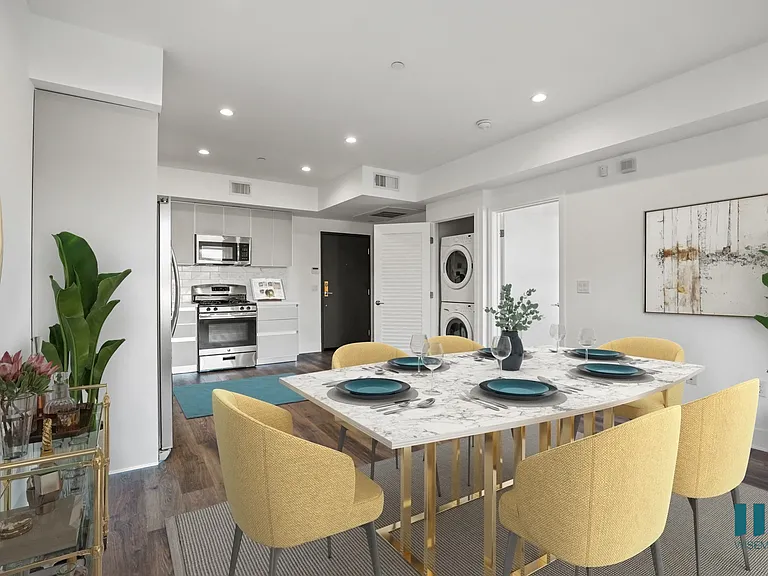 Open-Concept Kitchen and Dining Room with In-Suite Washer & Dryer