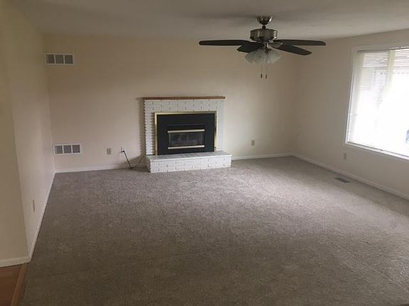 living room with gas fireplace