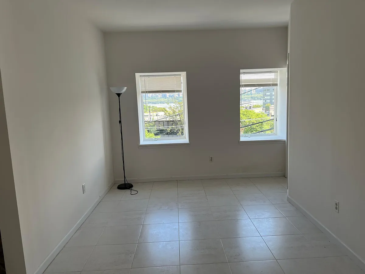 Building Photo - 9007 Riverside Pl #2