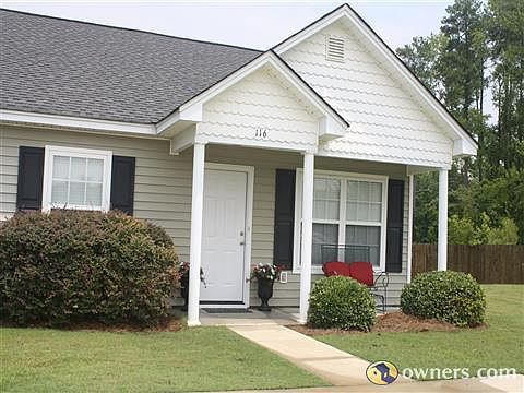 Spacious grassy area & quiet woods