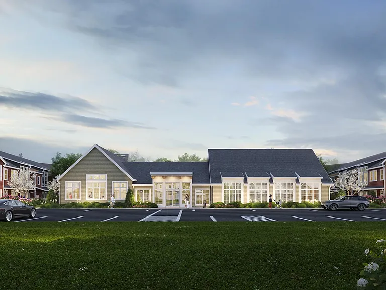 Resident clubhouse with fitness and social spaces, set within landscaped grounds and convenient on-site parking.