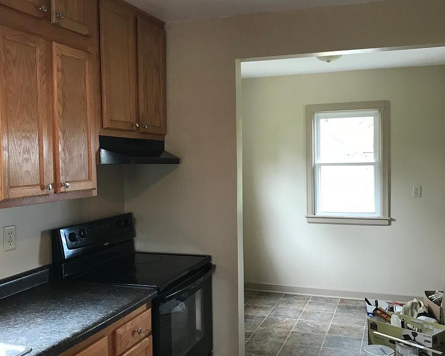 Breakfast nook overlooking fenced in backyard