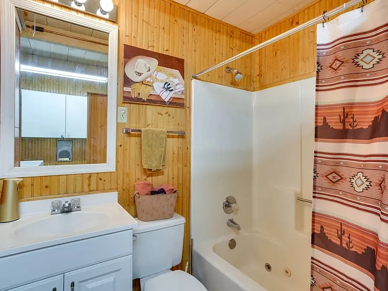 Full bath with washer and dryer