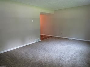 Living Room... Room for a table around the corner to the left.