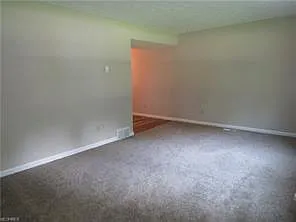 Living Room... Room for a table around the corner to the left.