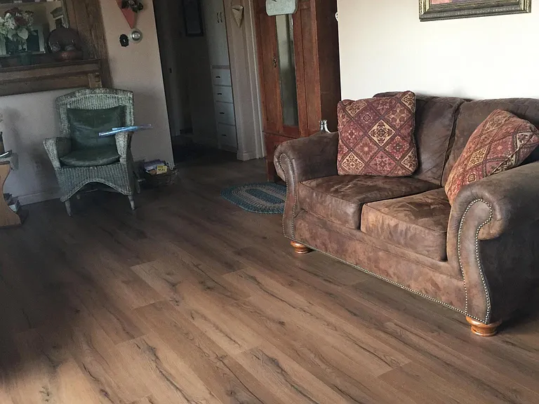 Large living room with new laminate flooring