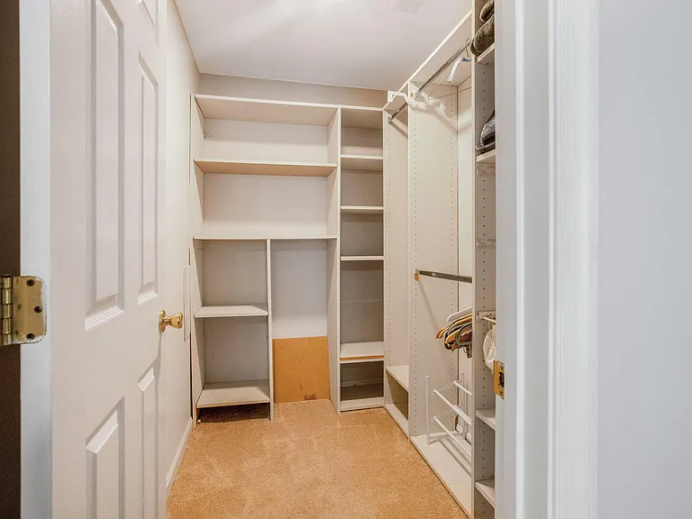 WALK IN CLOSET IN MASTER BEDROOM