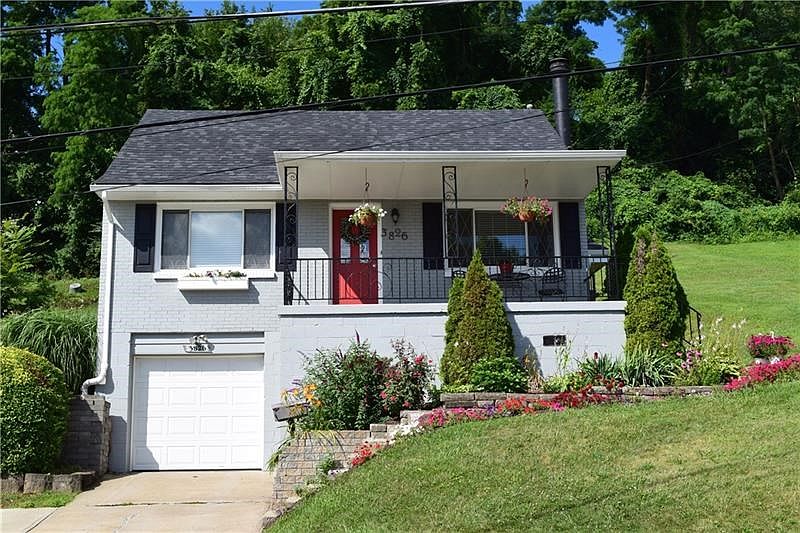 Welcome to 3826 Inland! Beautiful landscaping surrounds the property