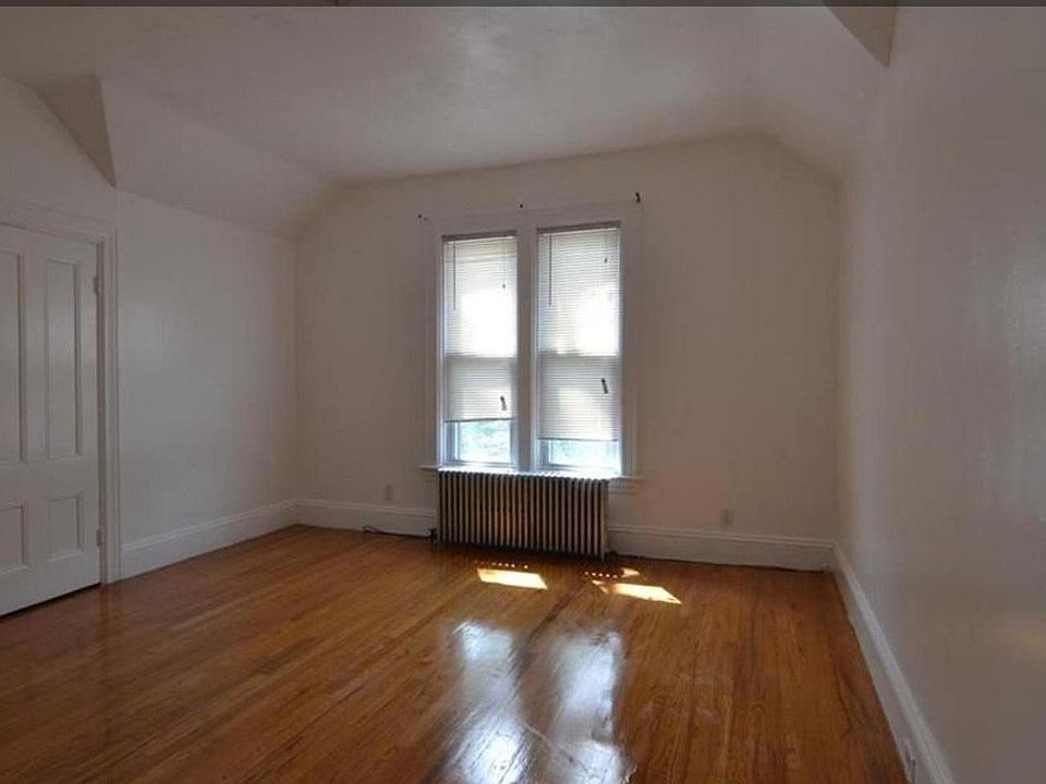 Large living room, with high ceilings! Also has large closet.