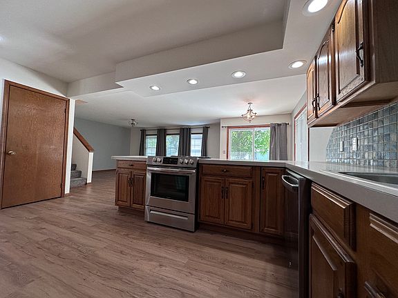 Kitchen looking towards, dining room, living room and slider to outdoor deck.