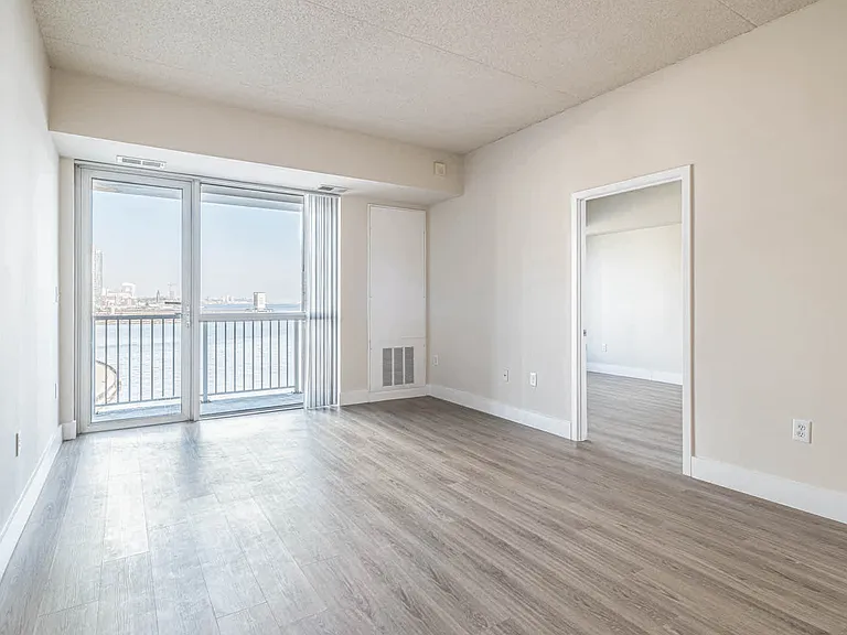 Living Room with Balcony and Hard Surface Flooring