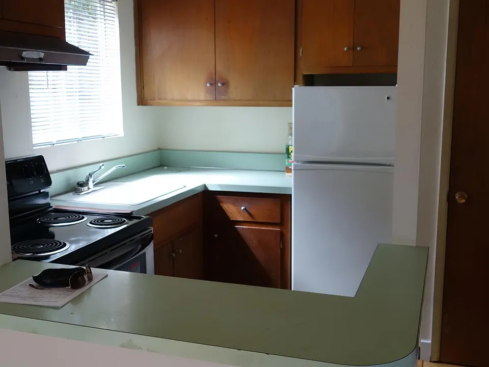 Bright Kitchen with ample counter space and cabinets