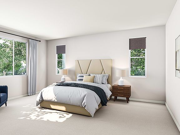 A spacious and well-lit bedroom with a large bed, neutral-toned decor, and floor-to-ceiling windows