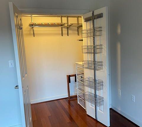 Bedroom closet with Elfa Shelving
