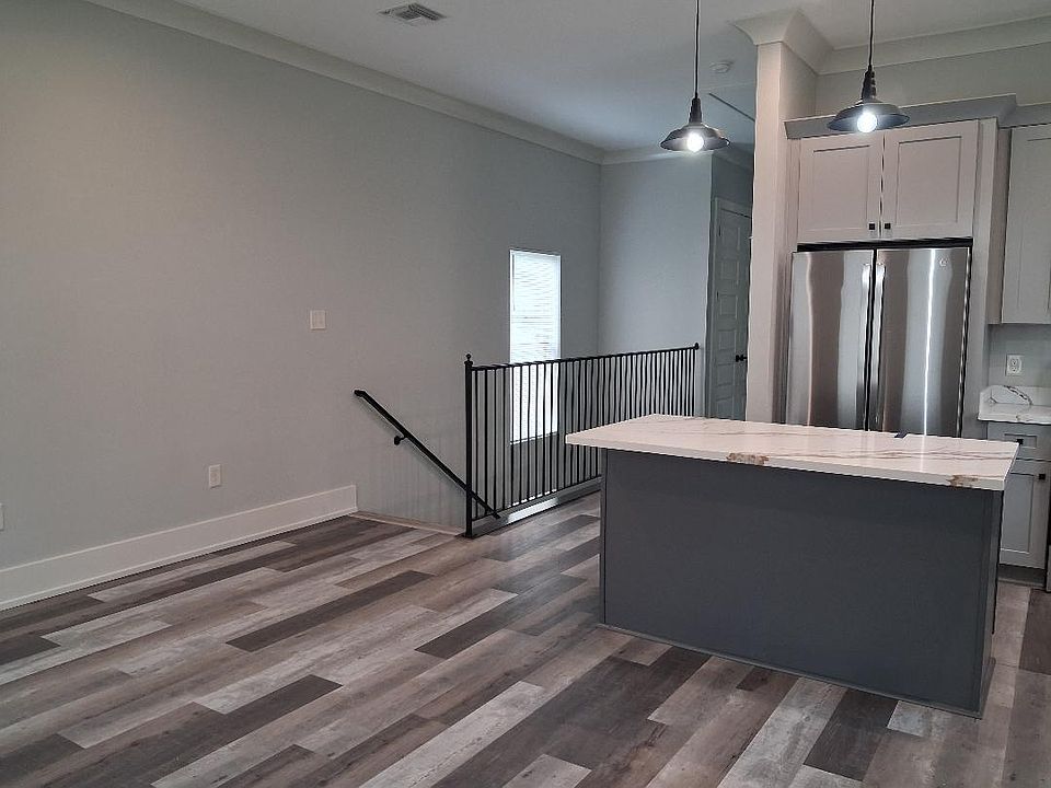 Large Living Room flows into kitchen; feels like one large entertainment room